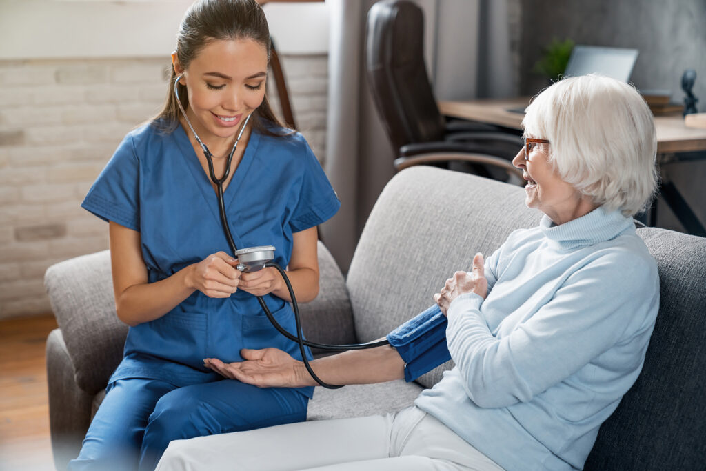 female nurse with elderly patient