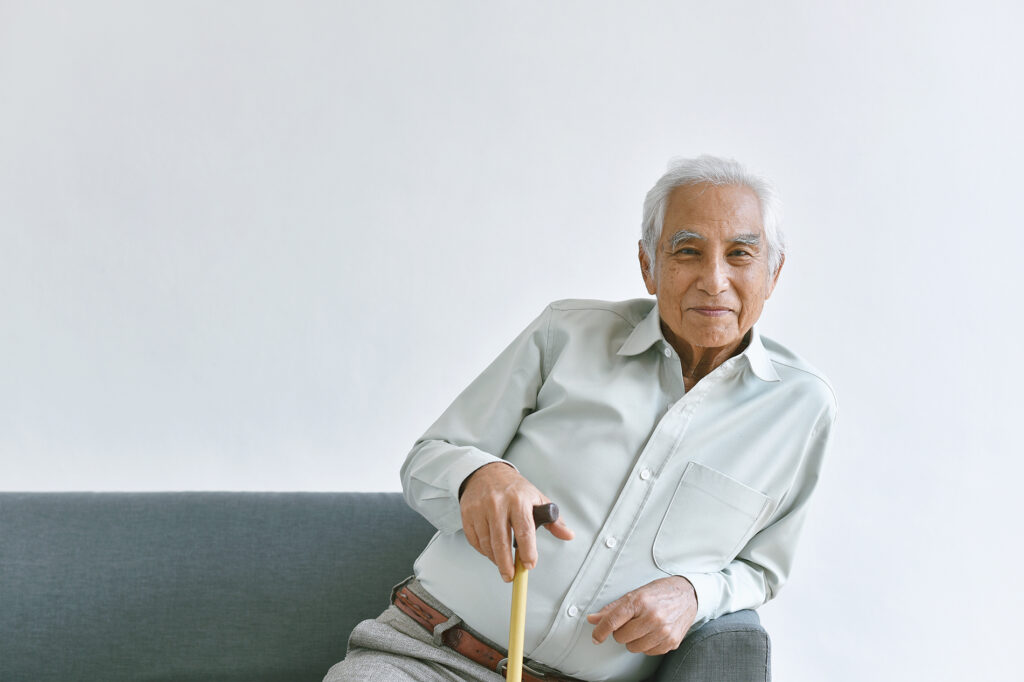 elderly man with cane
